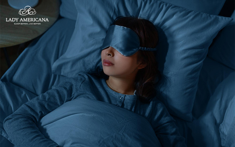 Woman sleeping comfortably in mattress