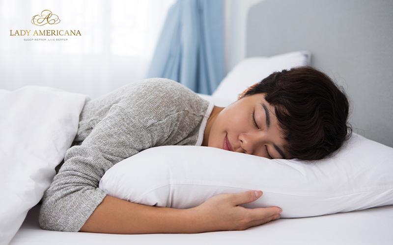 Woman sleeping well on mattress with pressure relief technology