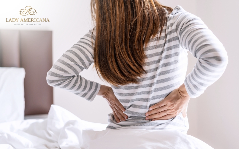 Woman experiencing back pain